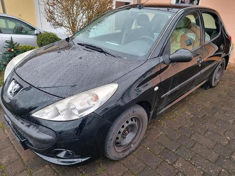 Gebraucht Peugeot 206+ 75 PS (55 kW) 2010 Schwarz Kleinwagen