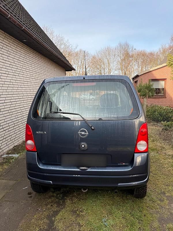 Używany Opel Agila 60 KM (44 kW) 2006 Niebieski Hatchback