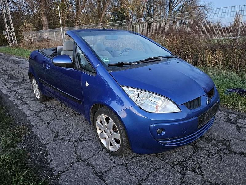 Aquamarinblau (p) Gebraucht 2007 Mitsubishi Colt Cabrio | 1.999 € (Fairer Preis) - Bild 1/4