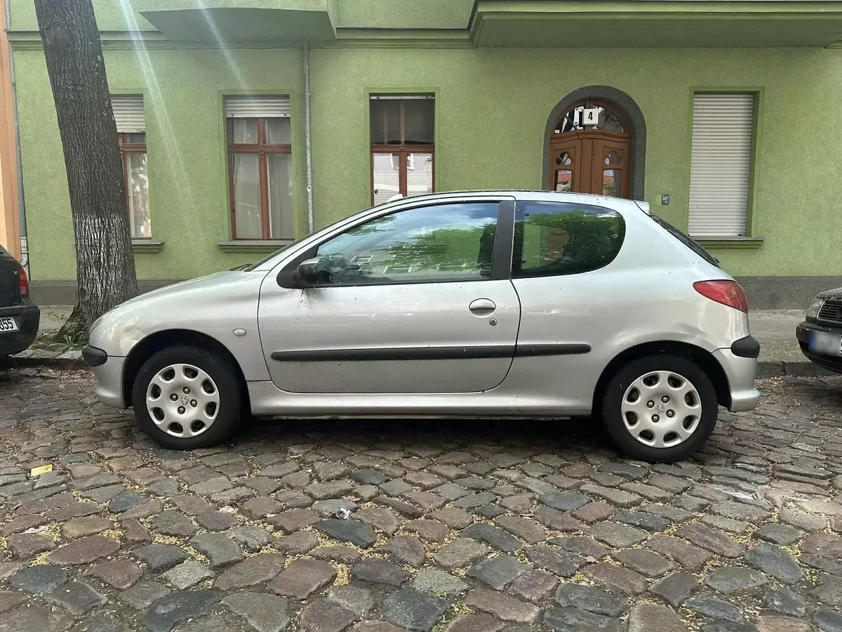 Używany Peugeot 206 60 KM (44 kW) 2004 Srebrny Hatchback