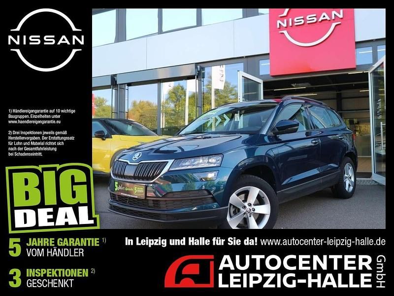 Lavablau metallic Gebraucht 2021 Skoda Karoq Ambition SUV | 25.440 € (Guter Preis) - Bild 1/4