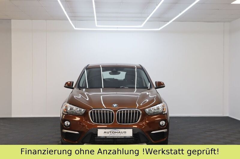 Braun Gebraucht 2016 BMW X1 Performance SUV | 19.990 € (Guter Preis) - Bild 1/4