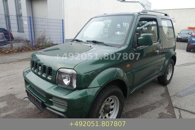 Grün Gebraucht 2010 Suzuki Jimny SUV | 4.991 € (Fairer Preis) - Bild 1/4
