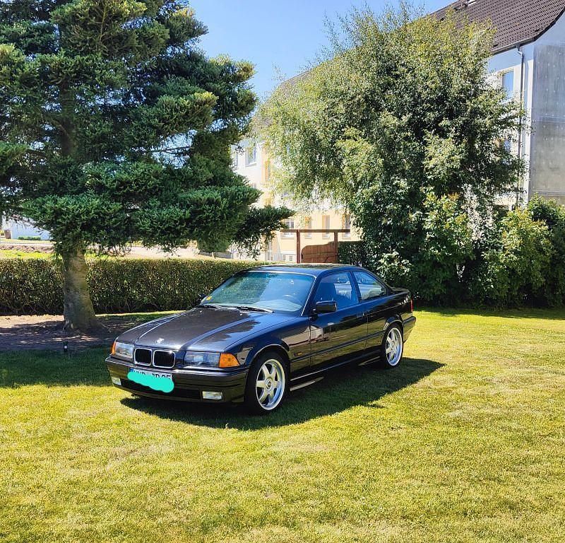 Schwarz Gebraucht 1995 BMW 320 Sport Line Coupé | 12.900 € - Bild 1/4