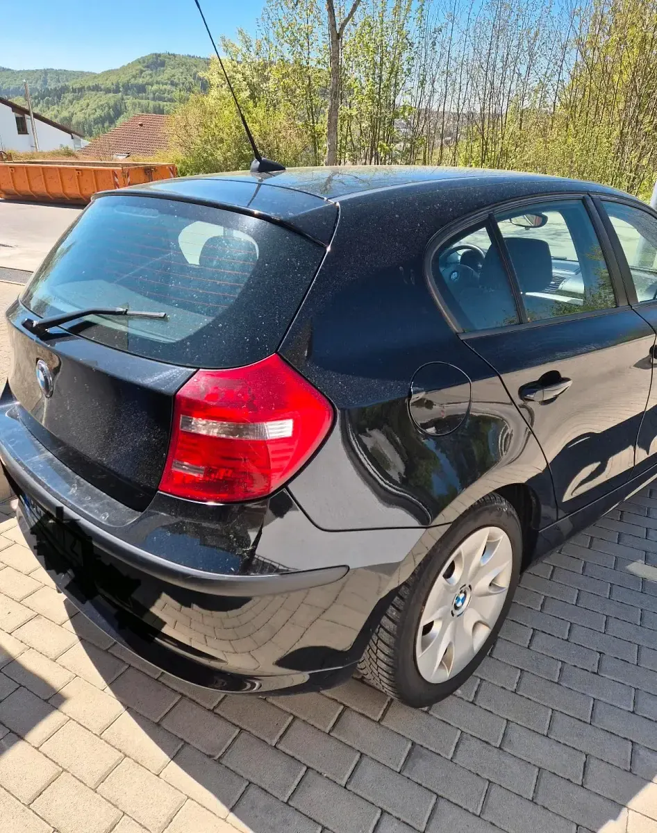 Używany BMW 116 122 KM (89 kW) 2009 Czarny Hatchback