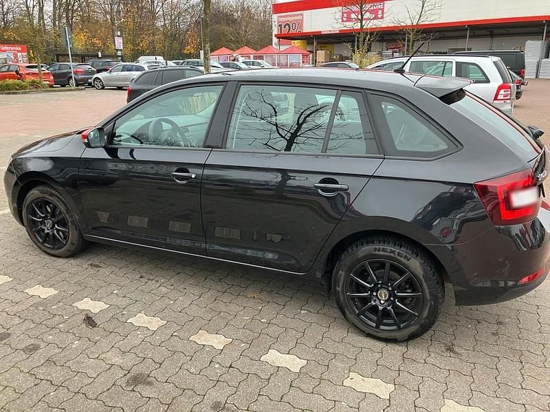 Używany Skoda Rapid 110 KM (80 kW) 2013 Czarny Hatchback