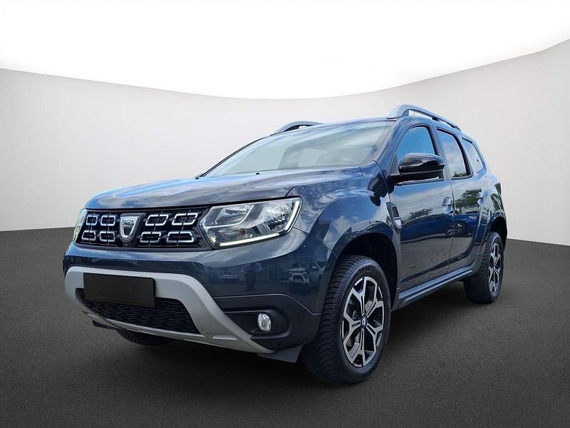 Grau "comete" Gebraucht 2021 Dacia Duster Celebration SUV | 16.490 € (Fairer Preis) - Bild 1/4