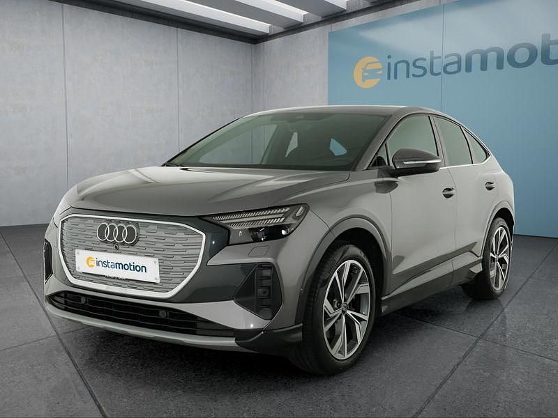 Grau Gebraucht 2022 Audi Q4 Sportback e-tron SUV | 26.749 € (Fairer Preis) - Bild 1/4