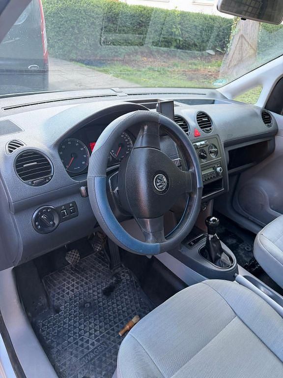 Second-hand VW Caddy 109 CP (80 kW) 2009 Argintiu Monovolum