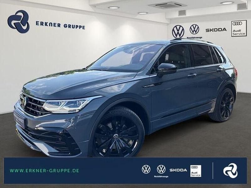 Delfingrau metallic Gebraucht 2023 VW Tiguan R-line SUV | 40.899 € (Fairer Preis) - Bild 1/4