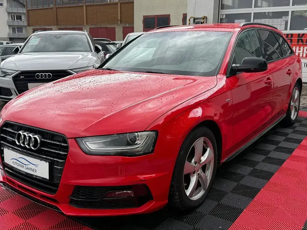 Używany Audi A4 Ambition 170 KM (125 kW) 2015 Czerwony Kombi