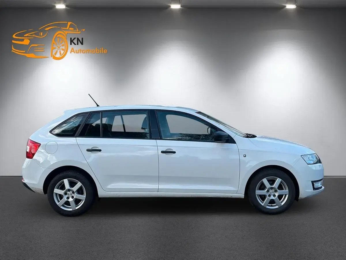 Używany Skoda Rapid 75 KM (55 kW) 2014 Biały Hatchback