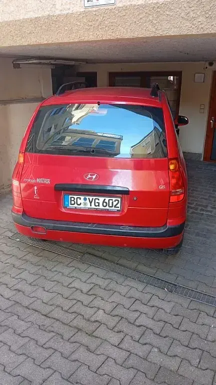 Gebraucht Hyundai Matrix 103 PS (75 kW) 2004 Rot Van / Kleinbus