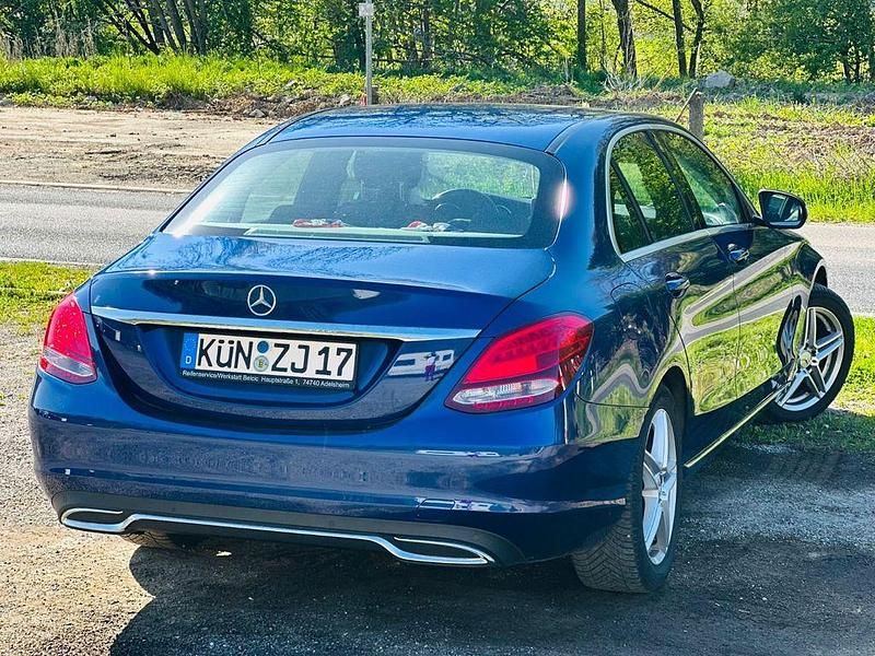 Second-hand Mercedes C180 Exclusive 156 CP (114 kW) 2016 Albastru Berlinǎ