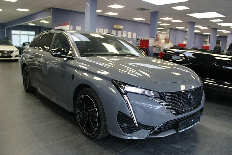 Grau Gebraucht 2024 Peugeot e-308 SW GT Kombi | 28.980 € - Bild 1/4