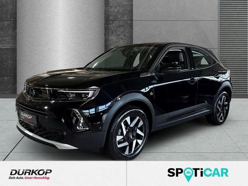 Diamant schwarz/karbon schwarz Gebraucht 2022 Opel Mokka-e Elegance SUV | 19.450 € (Fairer Preis) - Bild 1/4
