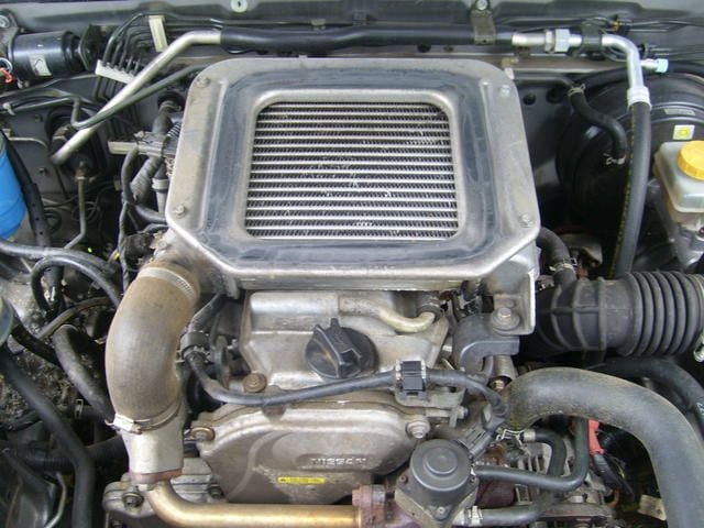 Gebraucht Nissan Navara 133 PS (97 kW) 2003 Silber metallic Pickup