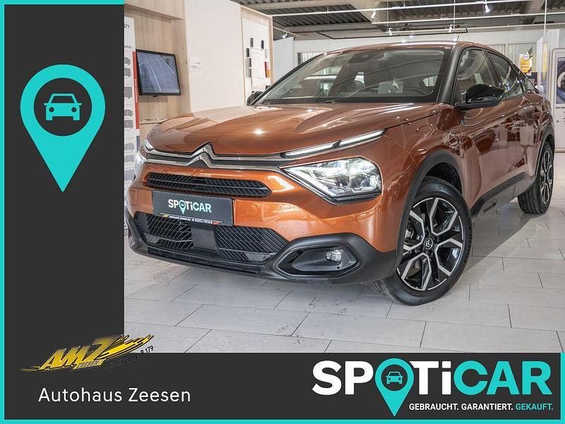 Karamellbraun (metallic) Gebraucht 2022 Citroën e-C4 Feel Limousine | 17.850 € (Guter Preis) - Bild 1/4
