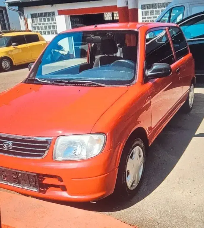 Brugt Daihatsu Cuore Plus 56 HK (41 kW) 2003 Rød Hatchback