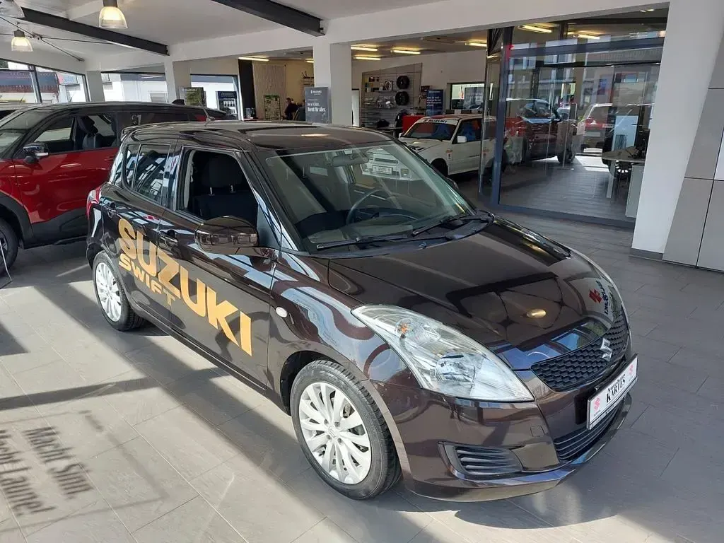 Gebraucht Suzuki Swift X-TRA 94 PS (69 kW) 2012 Braun Kleinwagen