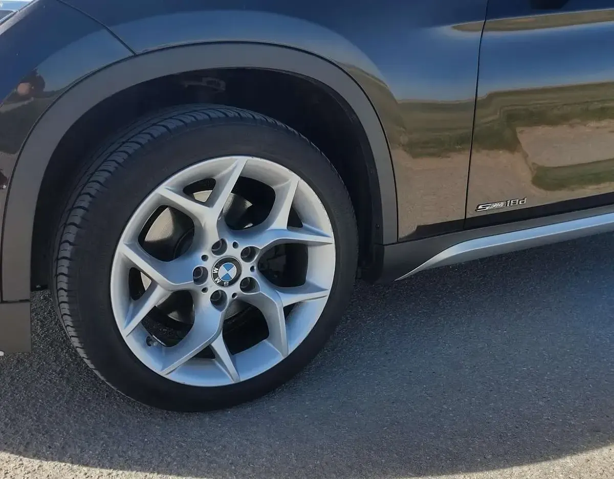 Używany BMW X1 143 KM (105 kW) 2014 Brązowy SUV