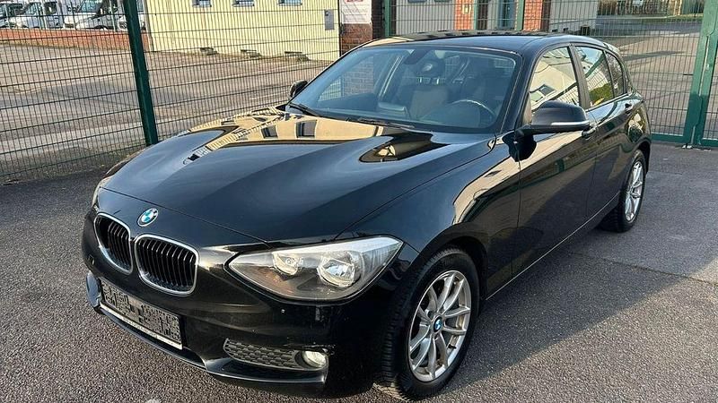 Schwarz Gebraucht 2013 BMW 116 Sport Line Kleinwagen | 3.900 € (Superpreis) - Bild 1/4