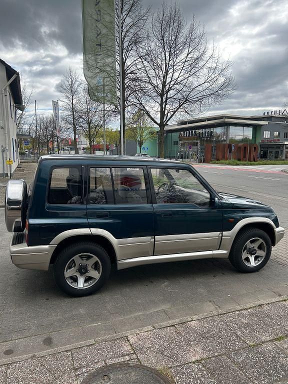 Gebraucht Suzuki Vitara 136 PS (100 kW) 1996 Grün SUV