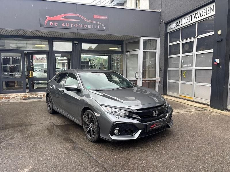 Grau Gebraucht 2018 Honda Civic Elegance Limousine | 14.950 € (Fairer Preis) - Bild 1/4
