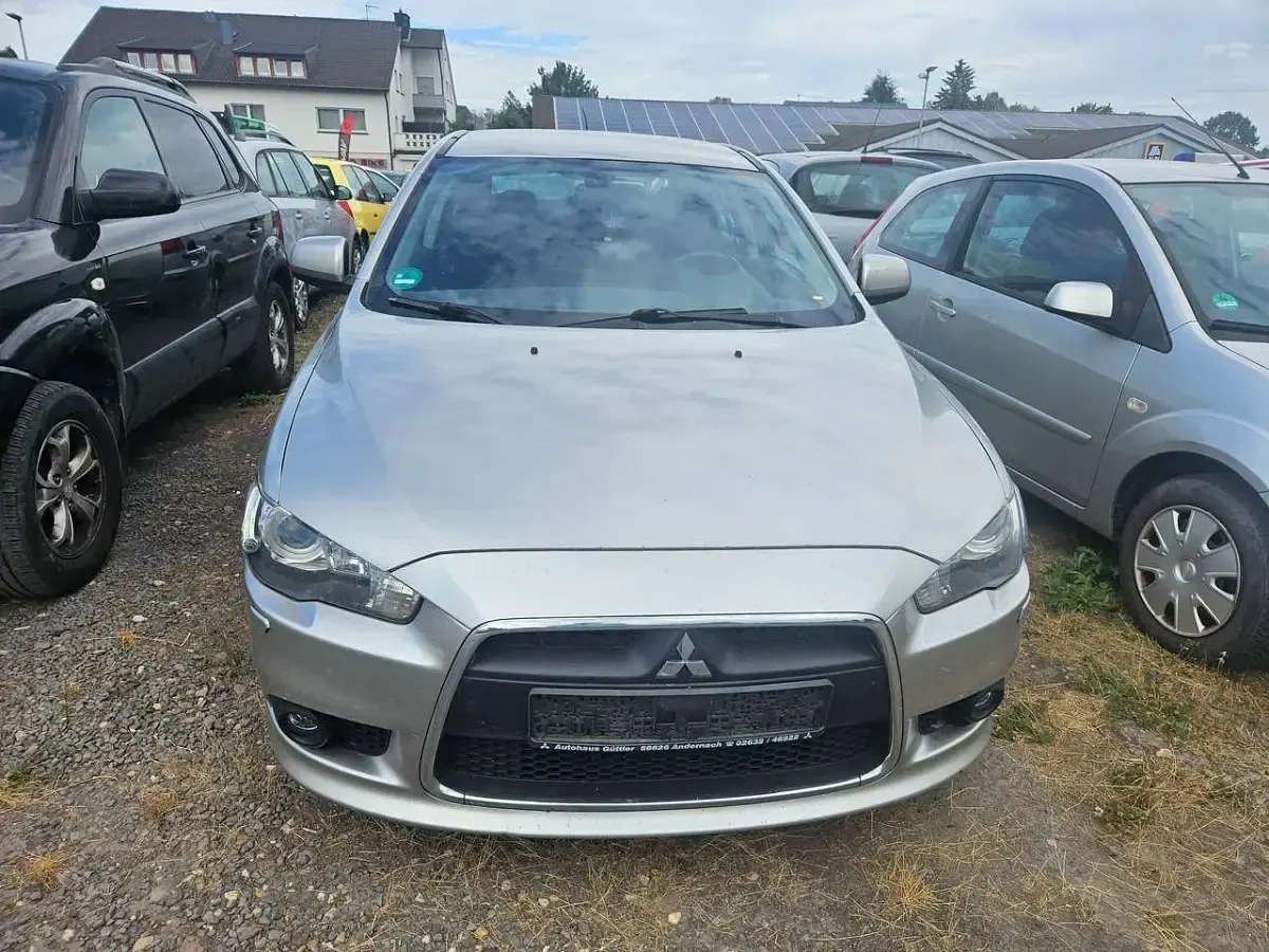Gebraucht Mitsubishi Lancer 150 PS (110 kW) 2013 Merkursilber (m) Limousine