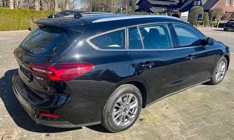 Gebraucht Ford Focus Titanium 125 PS (91 kW) 2023 Obsidianschwarz metallic Kombi
