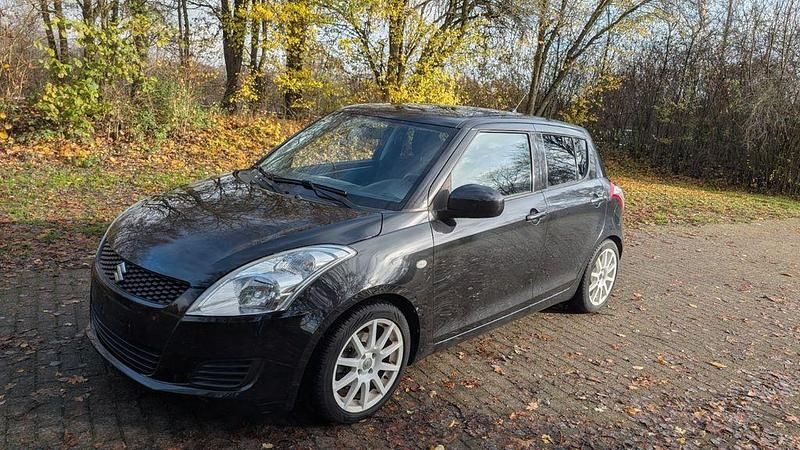Gebraucht Suzuki Swift 94 PS (69 kW) 2013 Schwarz Kleinwagen