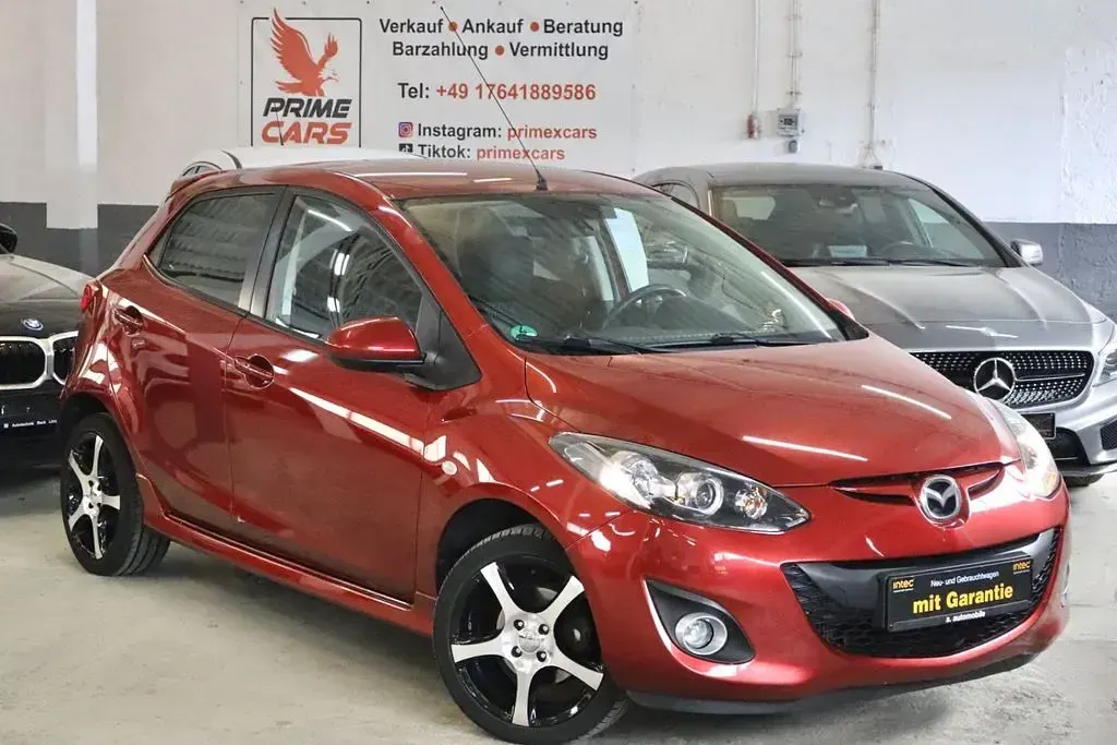 Gebraucht Mazda 2 Inclusive 95 PS (69 kW) 2013 Rot Kleinwagen