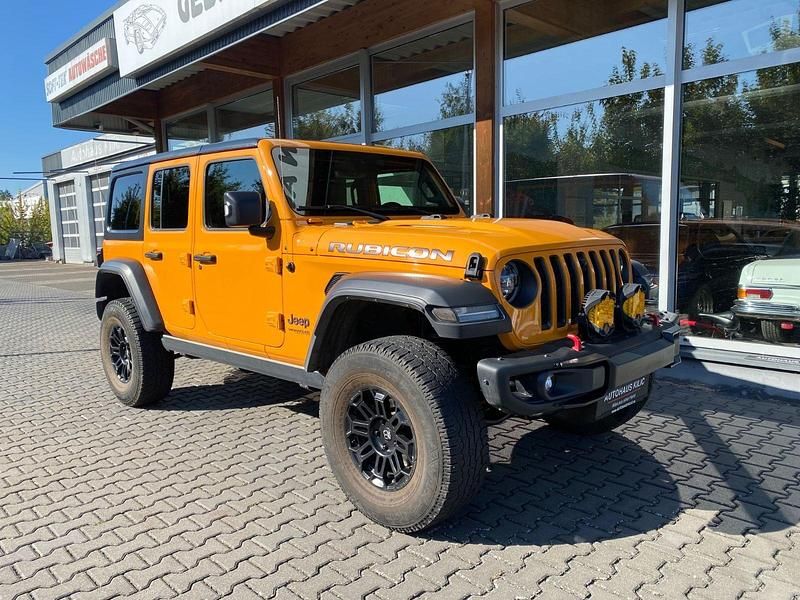 Orange Gebraucht 2021 Jeep Wrangler Unlimited Rubicon SUV | 50.990 € (Etwas zu teuer) - Bild 1/3