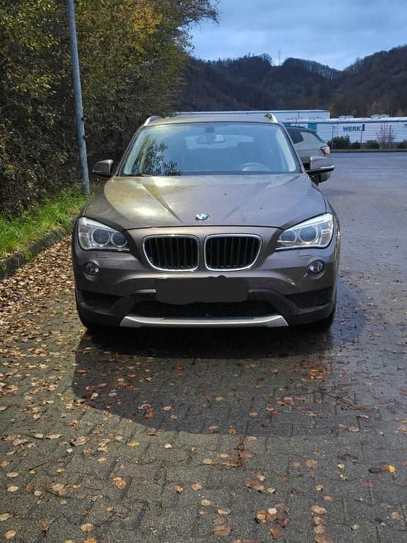 Braun Gebraucht 2013 BMW X1 SUV | 5.500 € - Bild 1/4