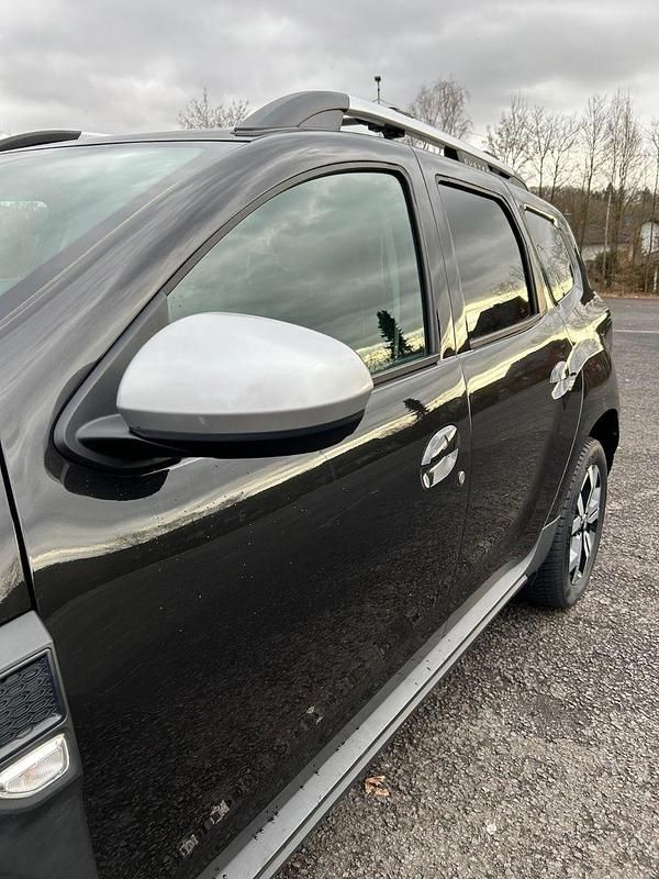 Używany Dacia Duster Prestige 116 KM (85 kW) 2022 Czarny SUV