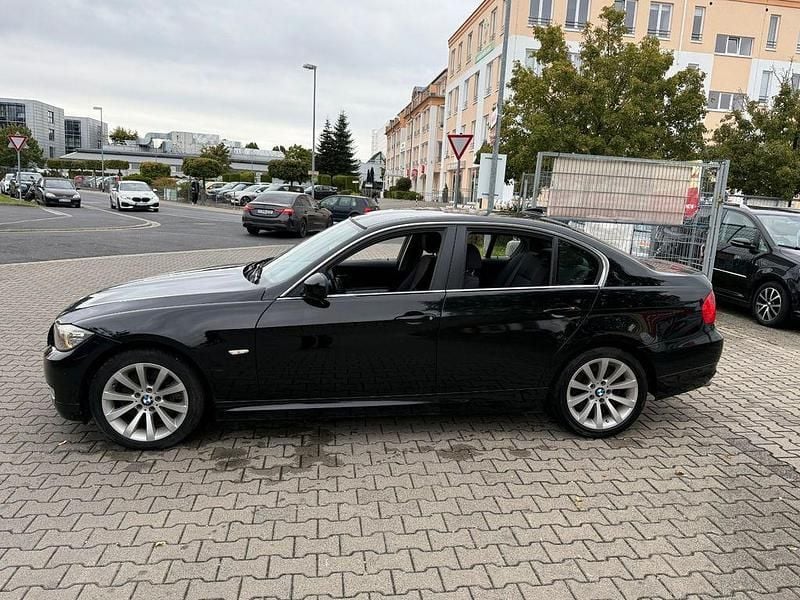 Second-hand BMW 330 Performance 245 CP (180 kW) 2011 Negru Berlinǎ