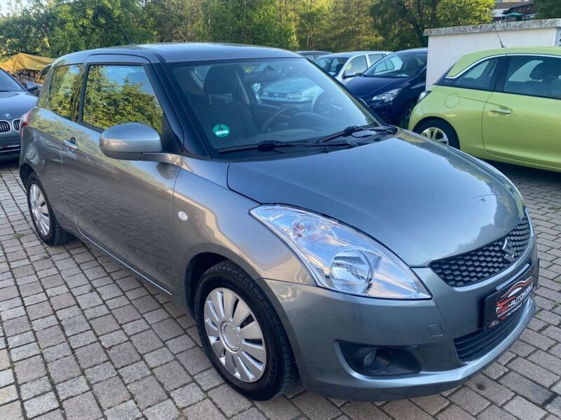 Grau Gebraucht 2011 Suzuki Swift Club Kleinwagen | 3.599 € (Fairer Preis) - Bild 1/4