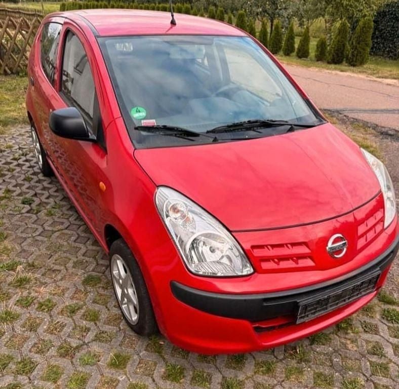 Gebraucht Nissan Pixo 68 PS (50 kW) 2011 Rot Kleinwagen