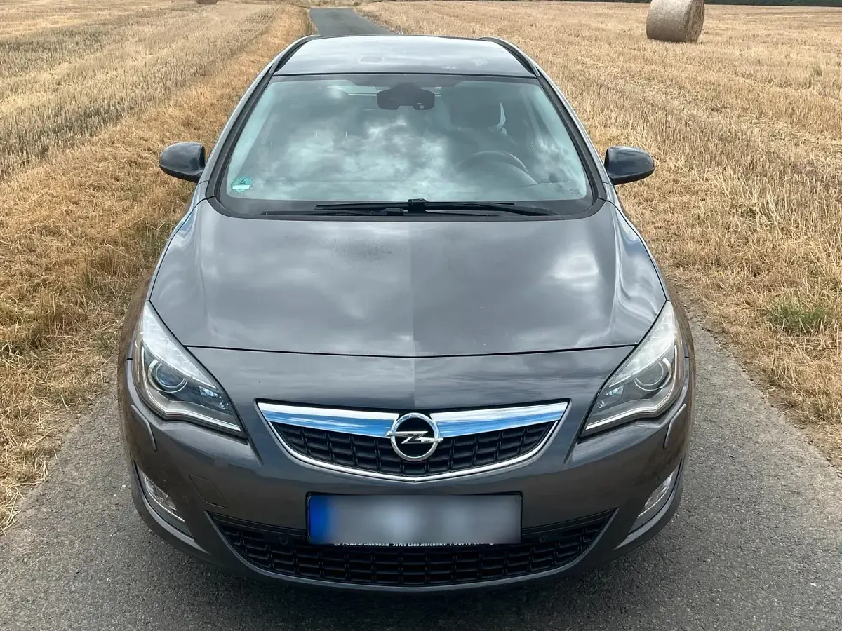 Gebraucht Opel Astra 125 PS (91 kW) 2010 Grau Kombi