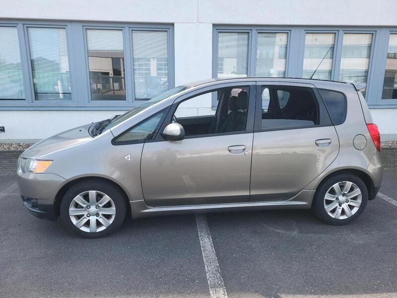 Grau Gebraucht 2010 Mitsubishi Colt Motion Kleinwagen | 3.250 € (Guter Preis) - Bild 1/4