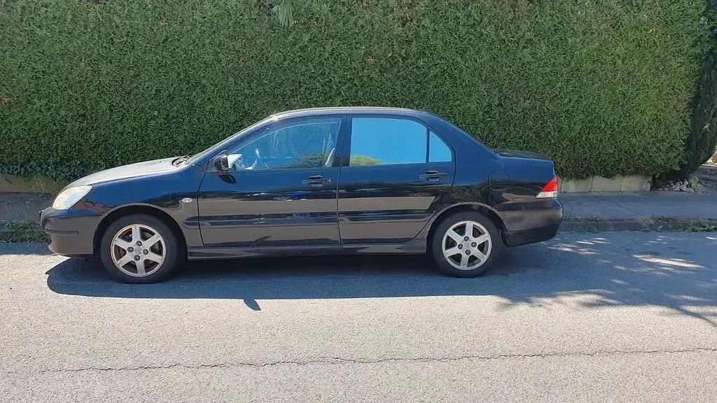 Gebraucht Mitsubishi Lancer 98 PS (72 kW) 2006 Schwarz Kombi