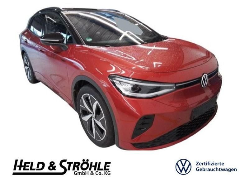 Kings red metallic Gebraucht 2024 VW ID.4 GTX SUV | 41.430 € (Guter Preis) - Bild 1/3