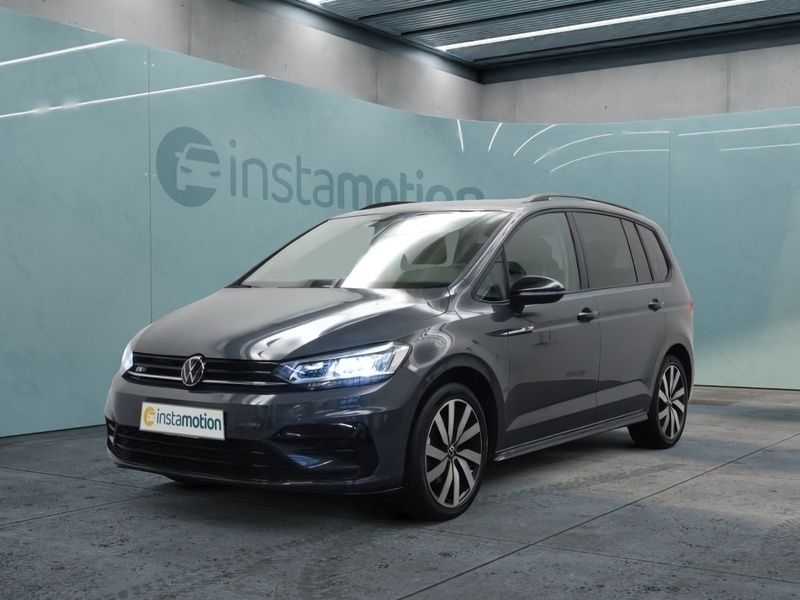 Grau Gebraucht 2024 VW Touran Pro Van / Kleinbus | 38.849 € (Fairer Preis) - Bild 1/4