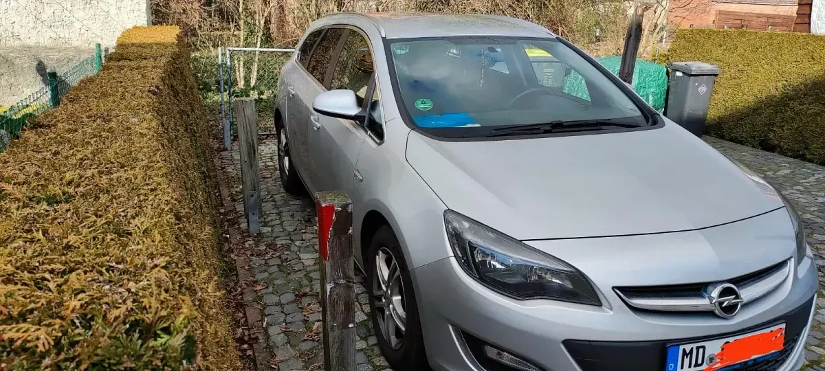 Gebraucht Opel Astra 110 PS (80 kW) 2013 Grau Kombi