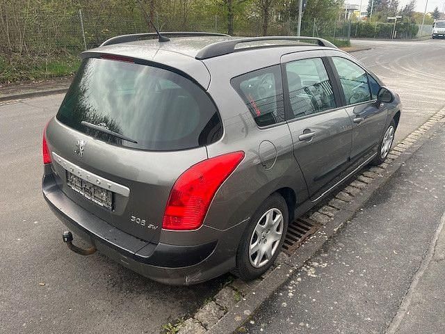 Gebraucht Peugeot 308 SW Tendance 95 PS (69 kW) 2009 Lackierung moondust/metallicl Kombi