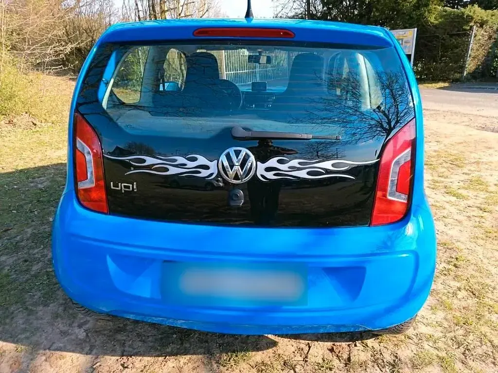 Używany VW up! Cup 60 KM (44 kW) 2014 Niebieski Hatchback
