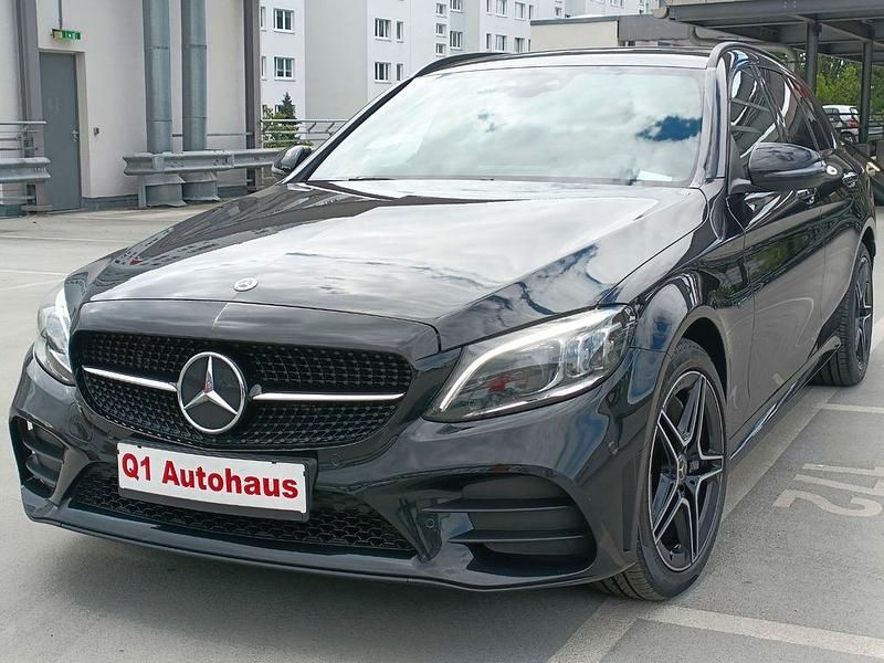 Schwarz/baltic black Gebraucht 2021 Mercedes C300e AMG Kombi | 25.400 € (Superpreis) - Bild 1/4