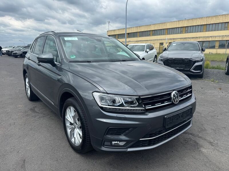 Indiumgrau metallic Gebraucht 2018 VW Tiguan Highline SUV | 23.999 € (Guter Preis) - Bild 1/4