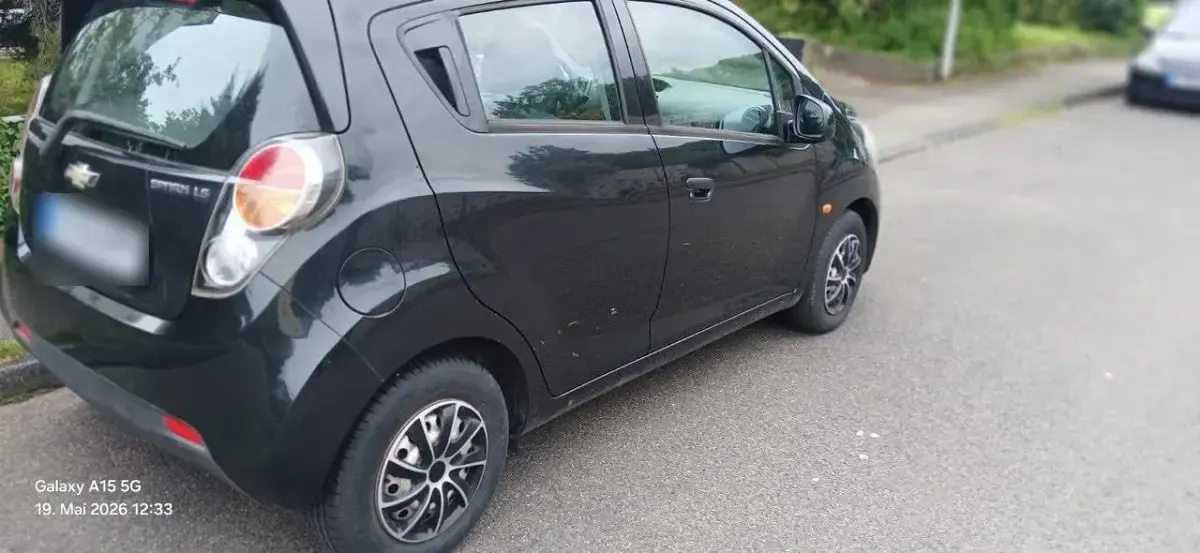 Gebraucht Chevrolet Spark 82 PS (60 kW) 2011 Schwarz Kleinwagen