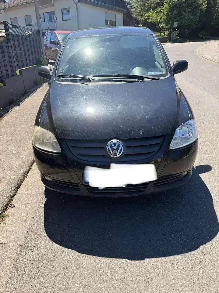 Gebraucht VW Fox Style 54 PS (39 kW) 2010 Schwarz Kleinwagen